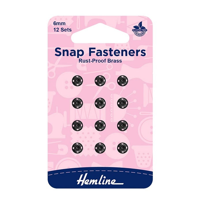 Pack of 6mm black snap fasteners with Hemline branding.