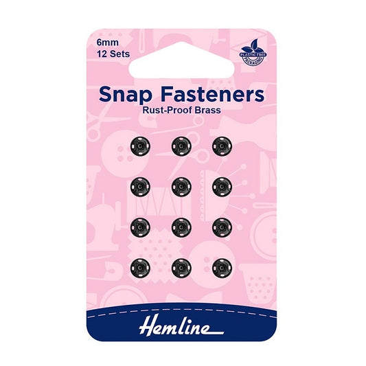 Pack of 6mm black snap fasteners with Hemline branding.