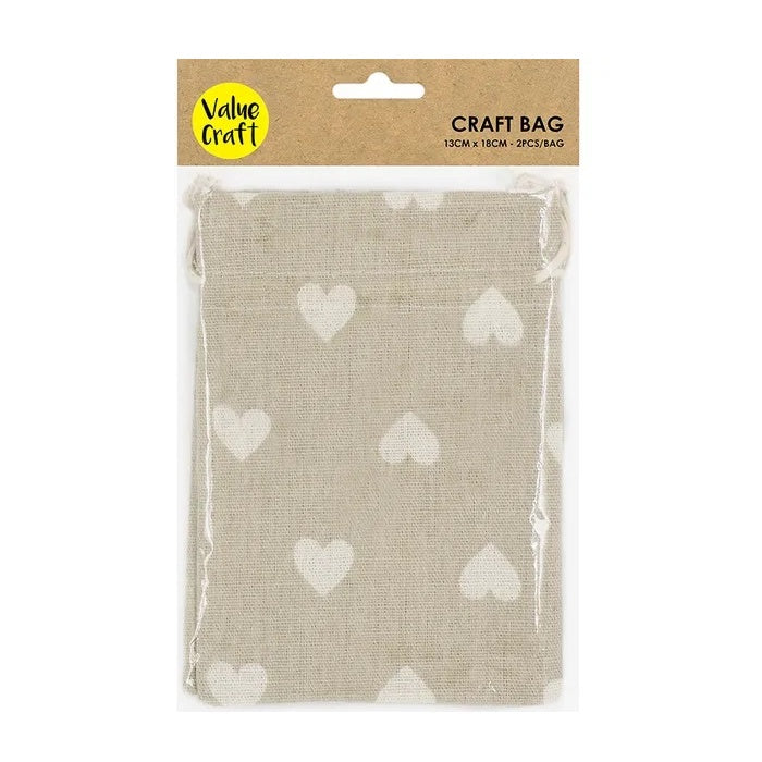 Packaged jute bags with white hearts.