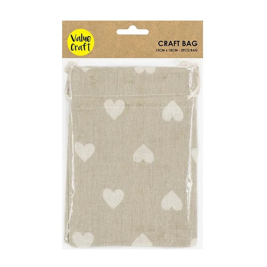 Packaged jute bags with white hearts.