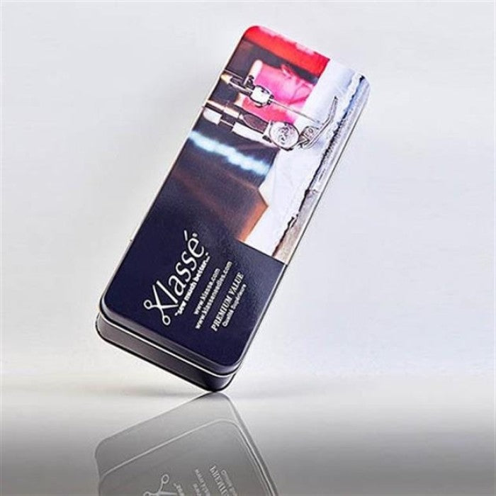 Machine needle gift tin with Klasse branding.