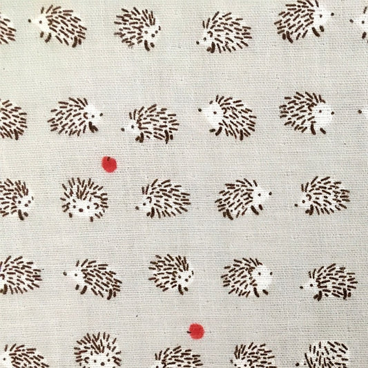 Small hedgehogs on a pale grey background.