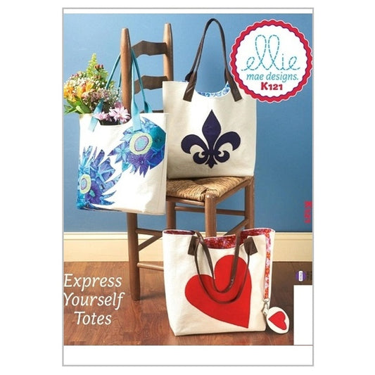 Sewing pattern cover with appliqued tote bag and purse.