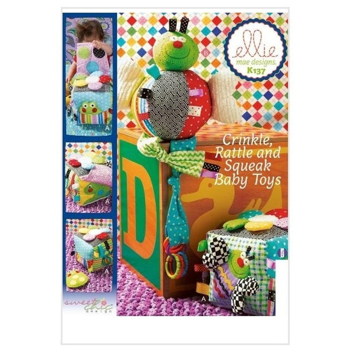 Sewing pattern cover with baby rattle toys.