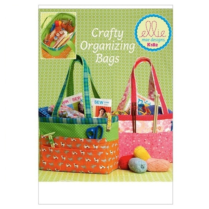 Sewing pattern cover with craft organiser bags.