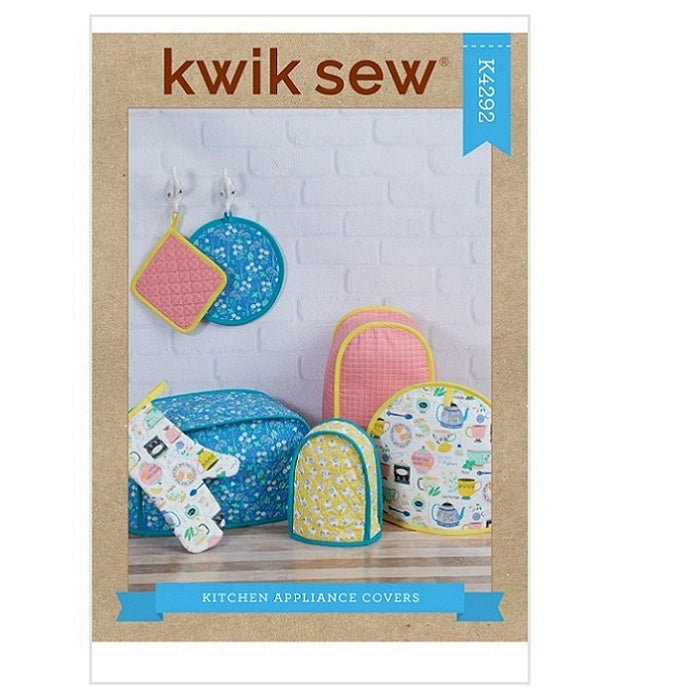 Sewing pattern cover with oven mitt, pot holders and appliance covers.