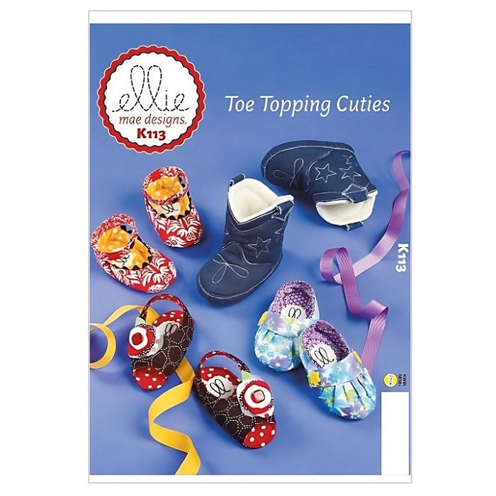 Pattern cover with  toddlers shoes and booties.