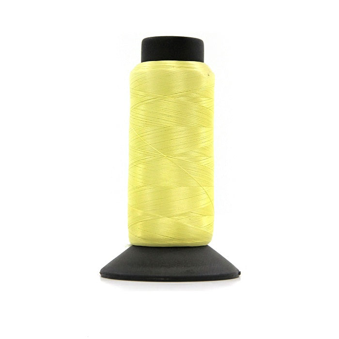 Cone of lemon woolly nylon thread.