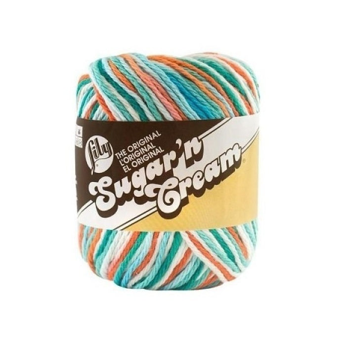 Ball of blue, green, coral and white yarn with Lily Sugar'n Cream branding.