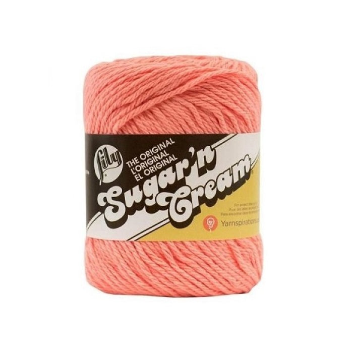 Ball of peach yarn with Lily Sugar'n Cream branding.
