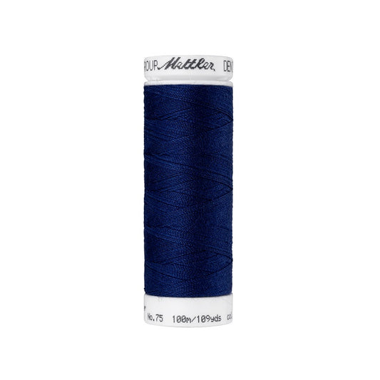 Spool of dark blue thread with Mettler branding.