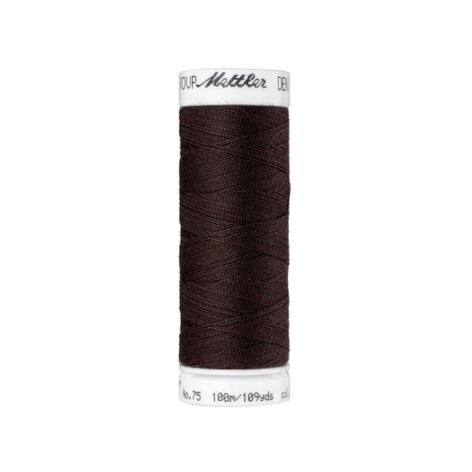 Spool of dark brown thread with Mettler branding.
