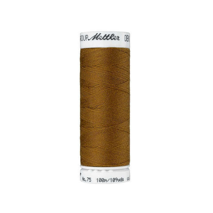 Spool of brown thread with Mettler branding.