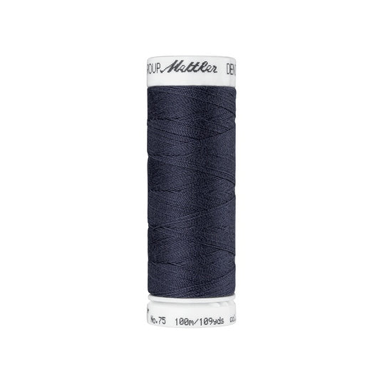 Spool of dark grey thread with Mettler branding.