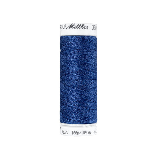 Spool of navy blue thread with Mettler branding.