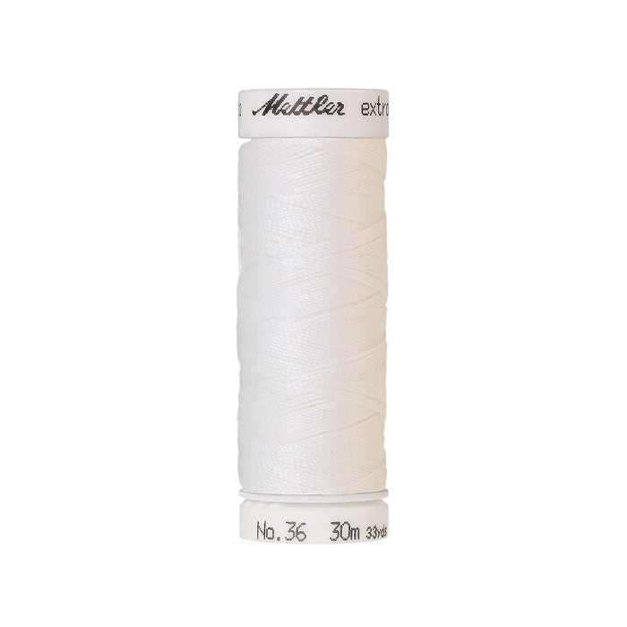 Spool of white extra strong thread with Mettler branding.