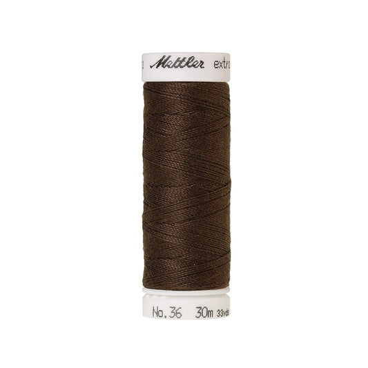 Spool of brown extra strong thread with Mettler branding.