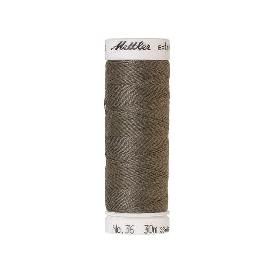 Spool of grey brown extra strong thread with Mettler branding.