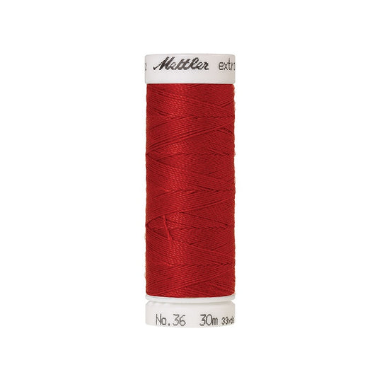 Spool of red extra strong thread with Mettler branding.