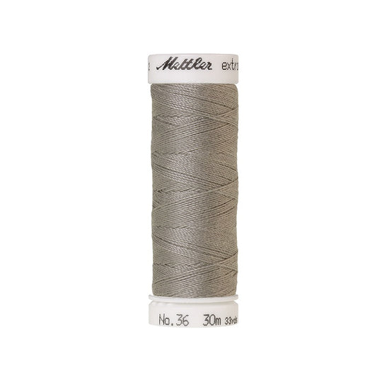 Spool of grey extra strong thread with Mettler branding.