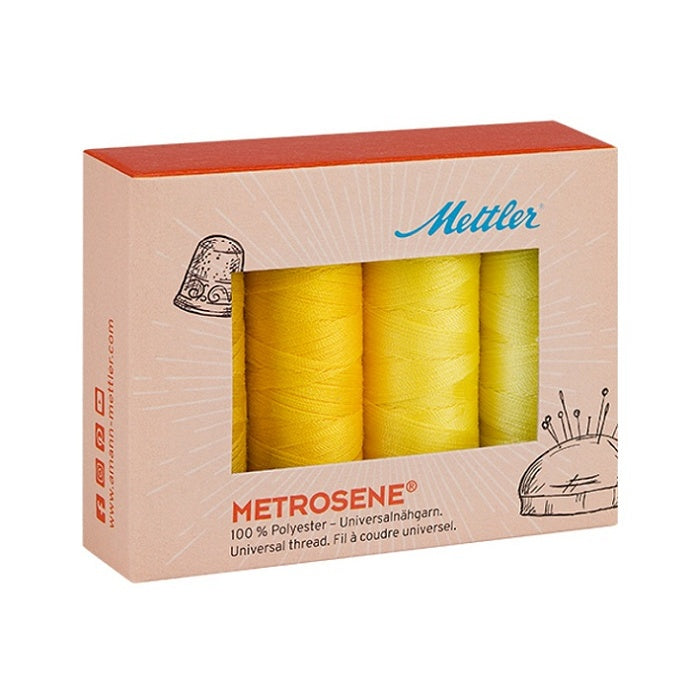 Mettler gift box with four spools of yellow thread.