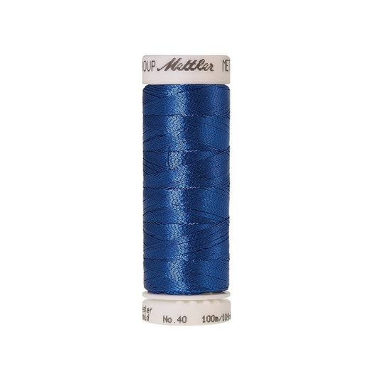 Spool of blue metallic thread with Mettler branding.