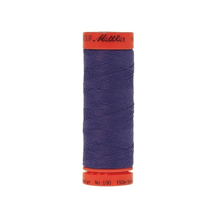 Spool of Mettler 150m dark dusky blue thread.