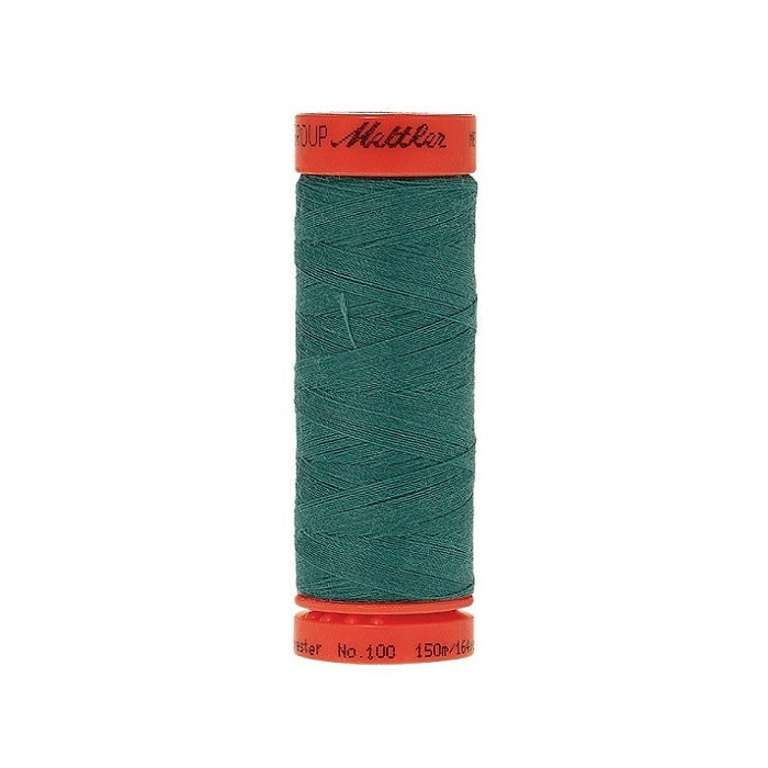 Spool of Mettler 150m teal green thread.