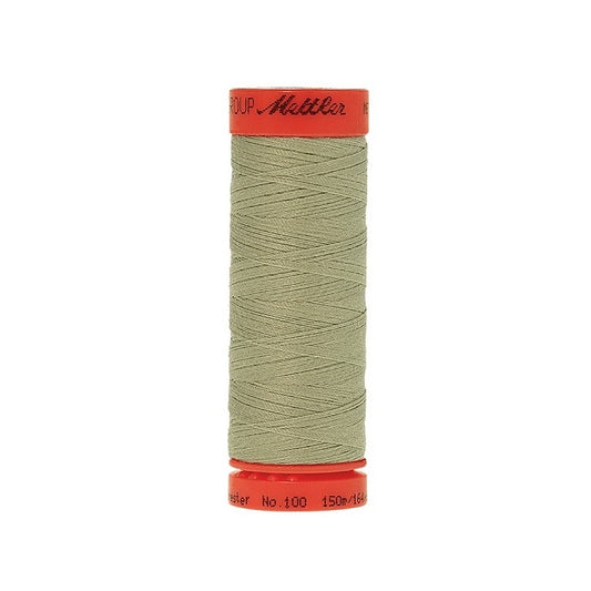 Spool of Mettler 150m light green thread.