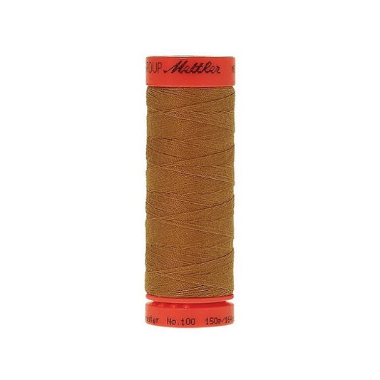 Spool of Mettler 150m tan brown thread.