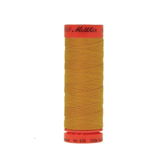 Spool of Mettler 150m gold thread.