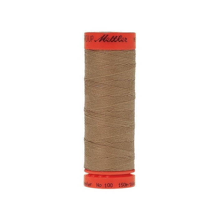 Spool of Mettler 150m brown thread.