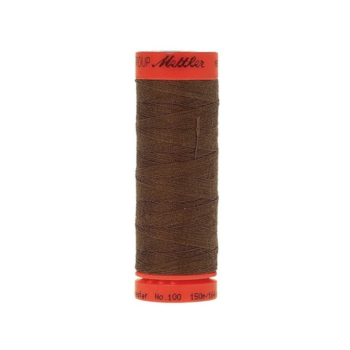 Spool of Mettler 150m dark brown thread.