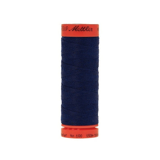 Spool of Mettler 150m dark blue thread.