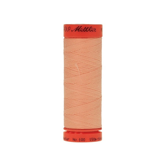 Spool of Mettler 150m pink orange  thread.