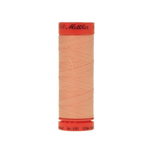 Spool of Mettler 150m pink orange  thread.