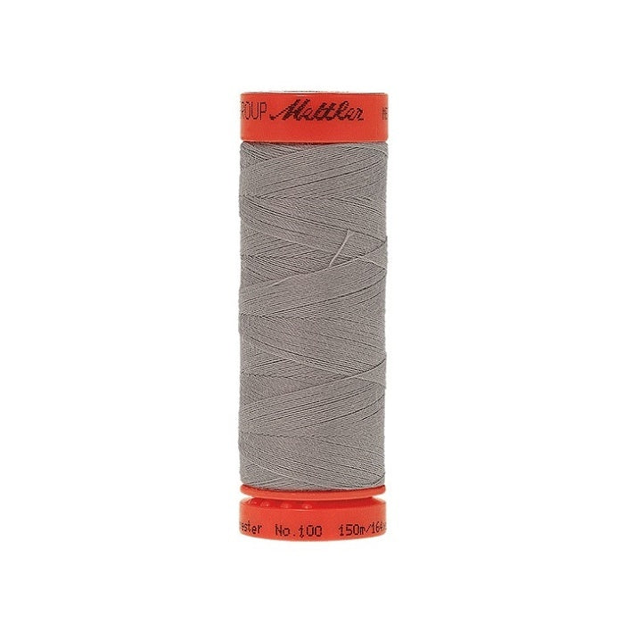 Spool of Mettler 150m silvery grey thread.