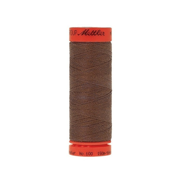 Spool of Mettler 150m dark brown thread.