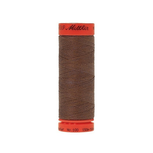 Spool of Mettler 150m dark brown thread.