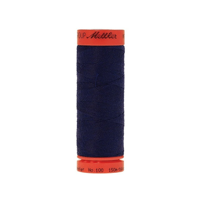 Spool of Mettler 150m dark blue thread.