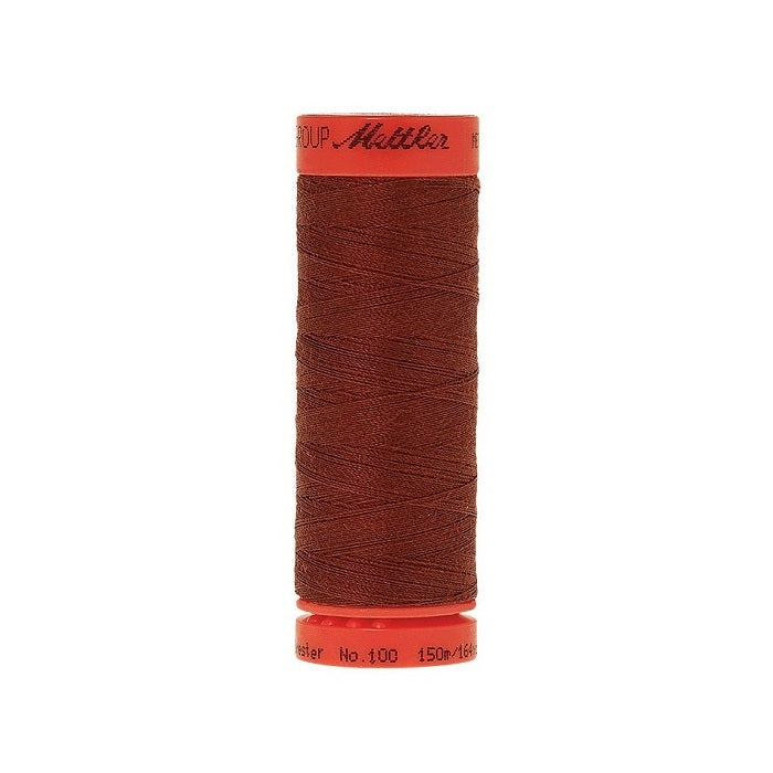 Spool of Mettler 150m brown thread.