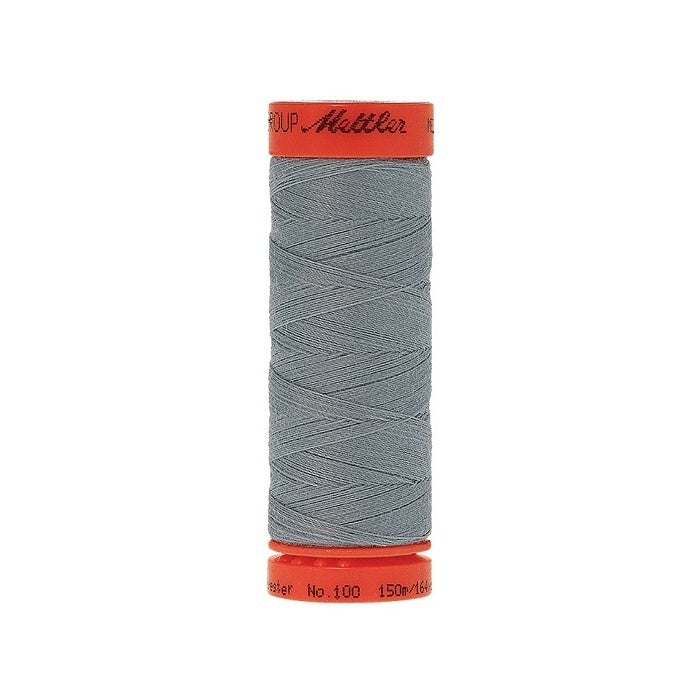 Spool of Mettler 150m mid grey thread.