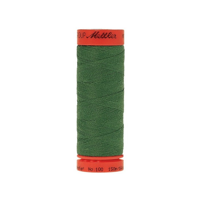 Spool of Mettler 150m green thread.