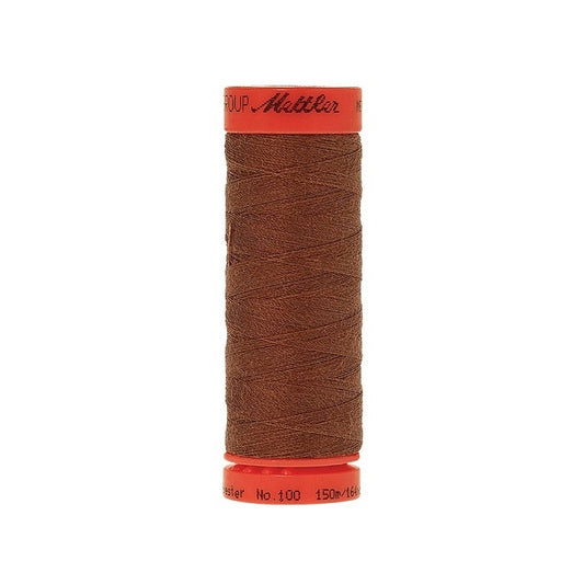 Spool of Mettler 150m brown thread.