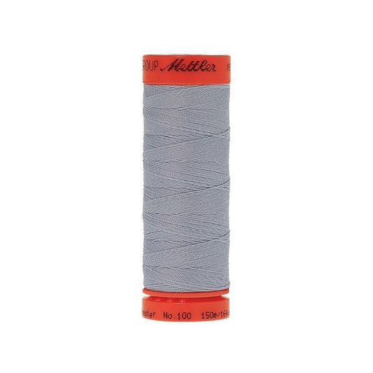 Spool of Mettler 150m blue grey thread.