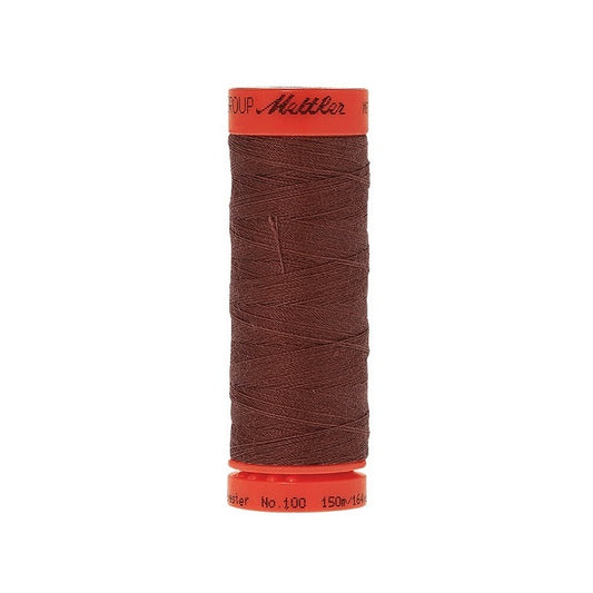 Spool of Mettler 150m dark brown thread.