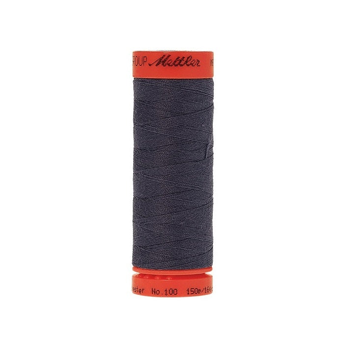 Spool of Mettler 150m dark blue thread.
