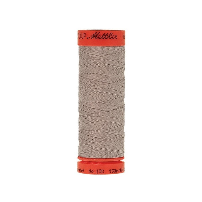 Spool of Mettler 150m grey thread.