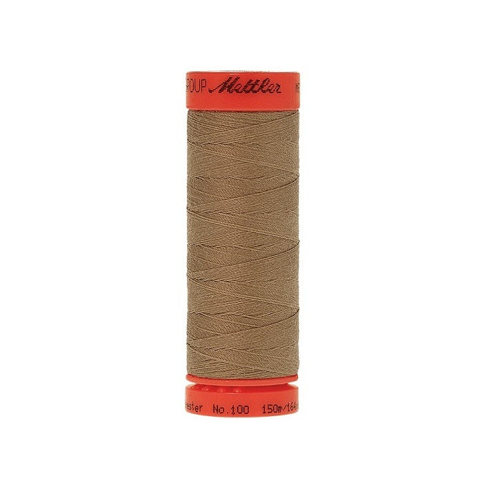 Spool of Mettler 150m brown thread.