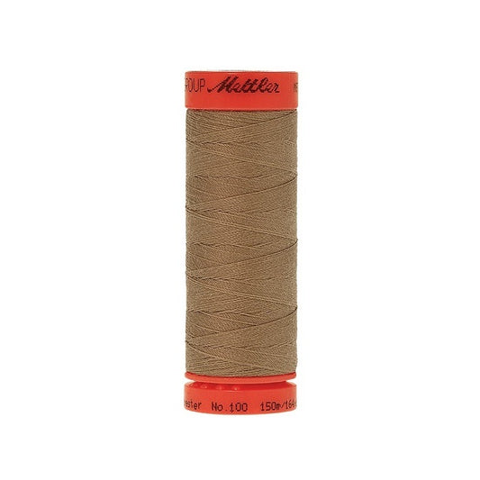 Spool of Mettler 150m brown thread.